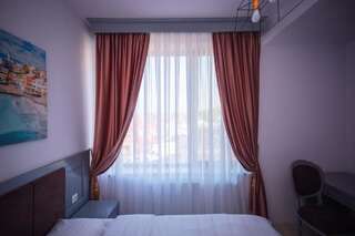 Отель HOTEL GLARIS Tîrgu Frumos Двухместный номер с 1 кроватью или 2 отдельными кроватями-2