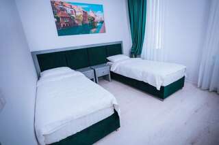 Отель HOTEL GLARIS Tîrgu Frumos Двухместный номер с 1 кроватью или 2 отдельными кроватями-7